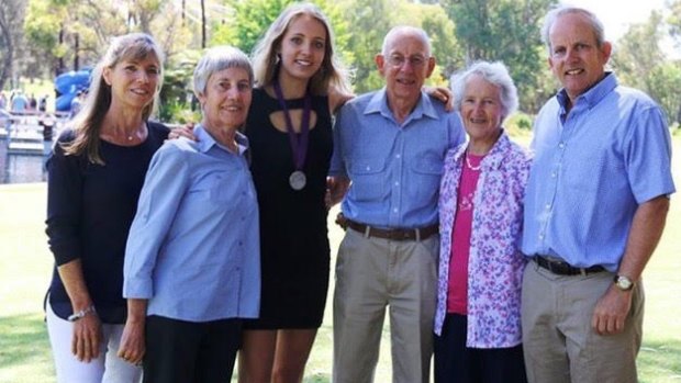 Caitlin with her parents and grandparents after receiving her Beazley Medal.