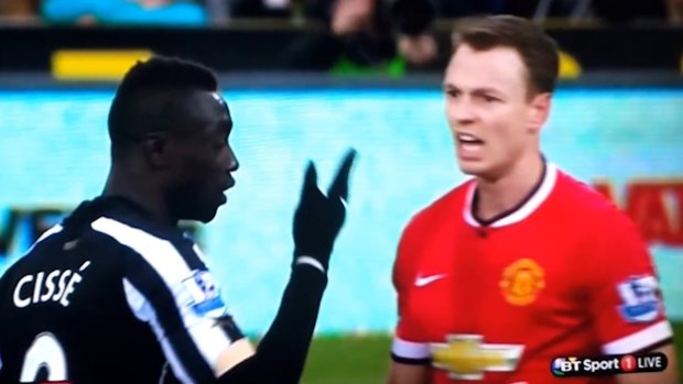 Evans appeared to spit towards the ground after a tussle with Cisse, who seemed to react by spitting at the Northern Irishman’s neck.