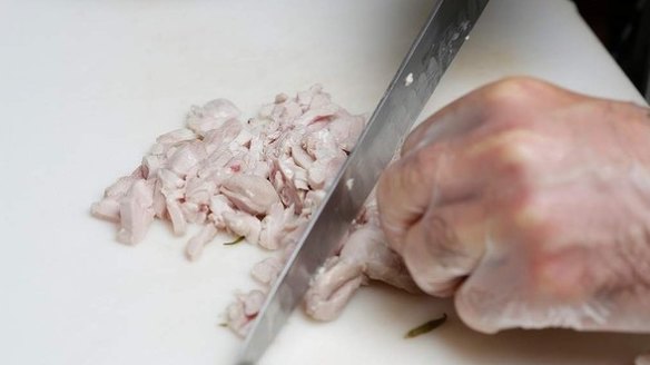 Step 2 Drain the chicken and slice finely, then dice. Be careful not to chop too finely as the chicken will lose texture and become a paste. 