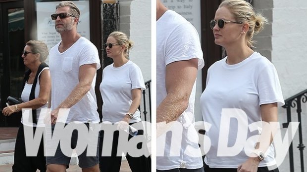 Papped: Lara Bingle taking her baby bump for a stroll in Palm Springs.