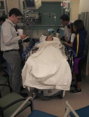 An image of Julie Swann-Paez in the hospital following the San Bernardino shooting.