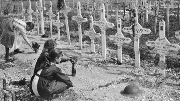 French children attend graves at Adelaide cemetery in 1919.