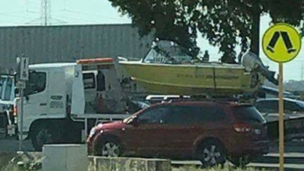 This picture of the boat being seized at Point Peron was posted to Facebook by a WA crayfisherman.