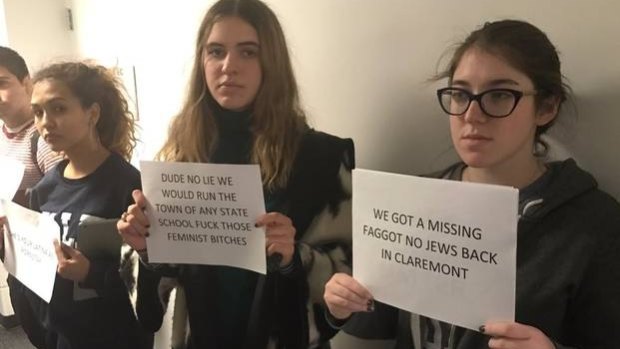 Students protest against Columbia University's wrestling team following the publication of sexist and racist messages sent by the athletes.