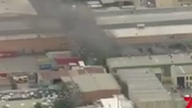 A fire has broken out at a car wrecking yard at Lansvale in Sydney's south-west.