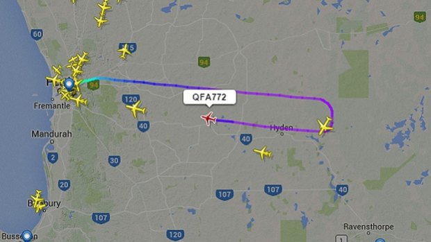 Qantas Flight 772 is shown turning around to head back to Perth.