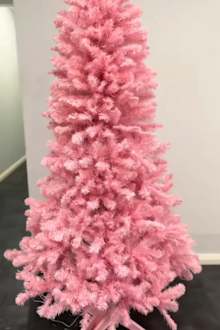 Woman shows off giant pink Kmart Christmas tree hack