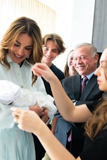 King Abdullah II and Queen Rania Al Abdullah meet their granddaughter Princess Iman bint Al Hussein