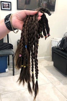 Kelly donated enough hair for two wigs.