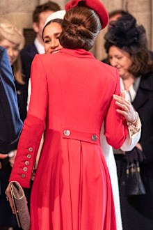 Meghan and Kate greeting orchestrated