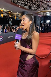 Maria Thattil enjoyed a chicken nugget on the red carpet.