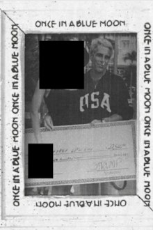 Jeffrey Epstein framed a photo of himself holding a cheque purportedly signed by Donald Trump, with his arm around a mystery woman.
