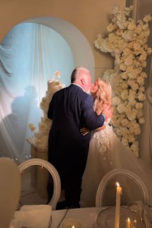 Kyle and Tegan cut $9413 wedding cake at their wedding reception