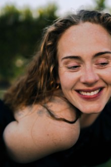 Adele looks happy and carefree in new photo as she marks 34th birthday.