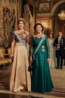 Queen Mary of Denmark and Queen Silvia of Sweden at a Gala Dinner to mark the Danish royals' first state visit since becoming monarchs