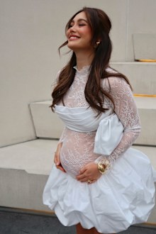 Francesca Hung shows off her belly while pregnant with her first child.