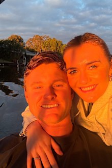 Ariarne Titmus with partner Mack