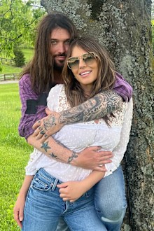 Elizabeth Hurley and Billy Ray Cyrus pose for new photos after confirming their unlikely romance