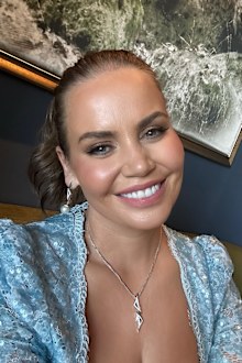 Jelena Dokic smiles at the camera in a sweet selfie.