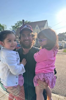 Singer Cassie's husband, Alex Fine, with their two daughters