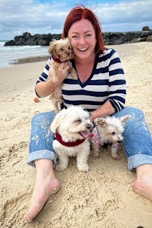 Shelly Horton with her three dogs, including Bella on the right.