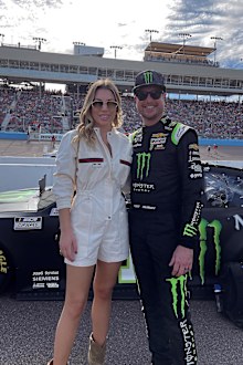 Ashley Busch supporting her husband at the end of racing season last November.