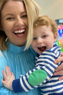 Amy Springhall shares a laugh with her young son.
