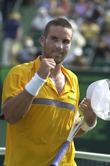 Pat Rafter of Australia celebrates his win over Roger Federer at the Ericsson Open in Miami, Florida. Credit: Matthew Stockman/ALLSPORT