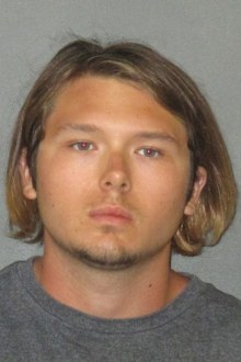 US teenager charged with killing abusive father who kidnapped him