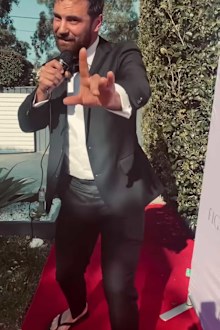 Cam Merchant's odd choice of shoes on red carpet. 