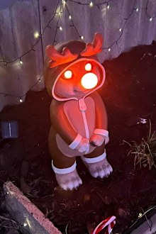 Bunnings Christmas decorations meerkat statue
