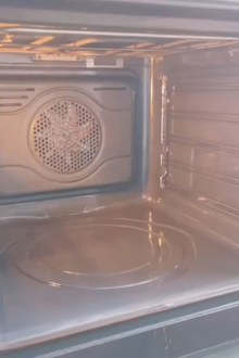 Woman shares TikTok hack for cleaning oven while you sleep.