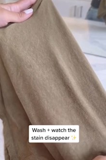 Cleaning TikTok laundry hack oil stain