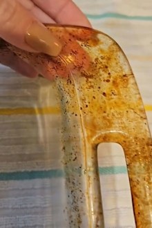 Grease-stained glass baking dish