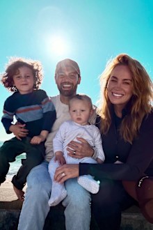 MAFS Jules Robinson and Cam Merchant pose as a family of four with sons Ollie and Carter. 