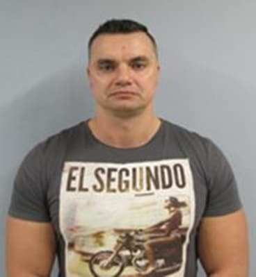 John Ibrahim's ex-bodyguard Neil Cummins hands himself into NSW police