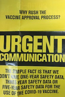 A pamphlet distributed by Clive Palmer questioning the vaccine approval process.