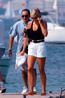 Diana, Princess of Wales and Dodi Fayed walk on a pontoon in the French Riviera resort of St. Tropez