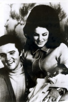 Priscilla and Elvis Presley with baby daughter Lisa Marie.
