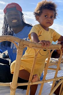 Brian Bwoga, pictured with his son Zaza.