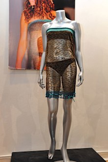 The dress, seen on Kate Middleton in the rear of the photo, which caught Prince William's eye.