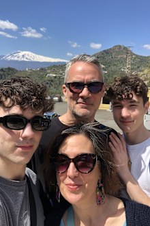 Here's a photo of Dina, Richard and their two sons in 2023.