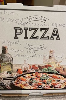 Heidi was shocked and delighted to read the note from the local pizza owners