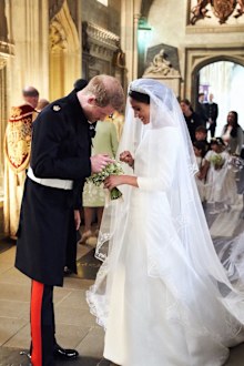 Meghan, the Duchess of Sussex, with Prince Harry, the Duke of Sussex, inside St George's Chapel at Windsor Castle on May 19, 2018, in Windsor.