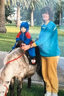 Joel Kleber, pictured with his mother. Joel was first placed into foster care at age 7.