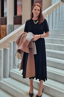 Karen Iles reported workplace sexual harassment only to see the perpetrator promoted.