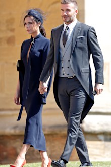 Victoria Beckham and David Beckham attend the wedding of Prince Harry to Ms Meghan Markle at St George's Chapel, Windsor Castle on May 19, 2018 in Windsor, England. 