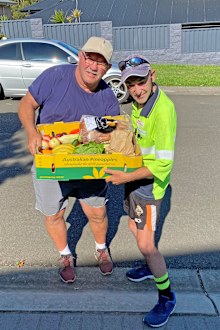 Locals have all rushed to help Mark after hearing of his cancer diagnosis. He is pictured here receiving a fruit and vegetable box from Box Divvy Calderwood Honeybee.