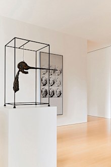 Giacometti's "Le Nez" (left) sold for $107.6 million, while Andy Warhol's "Nine Marilyns" (right) fetched $65 million.