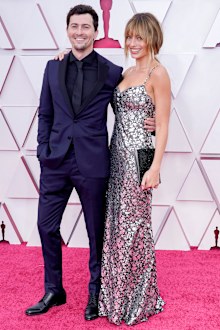 Josey McNamara and Margot Robbie arrive at the Oscars on Sunday, April 25, 2021, at Union Station in Los Angeles. 